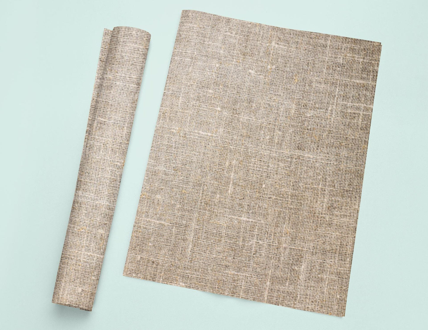 a piece of cloth next to a roll of paper