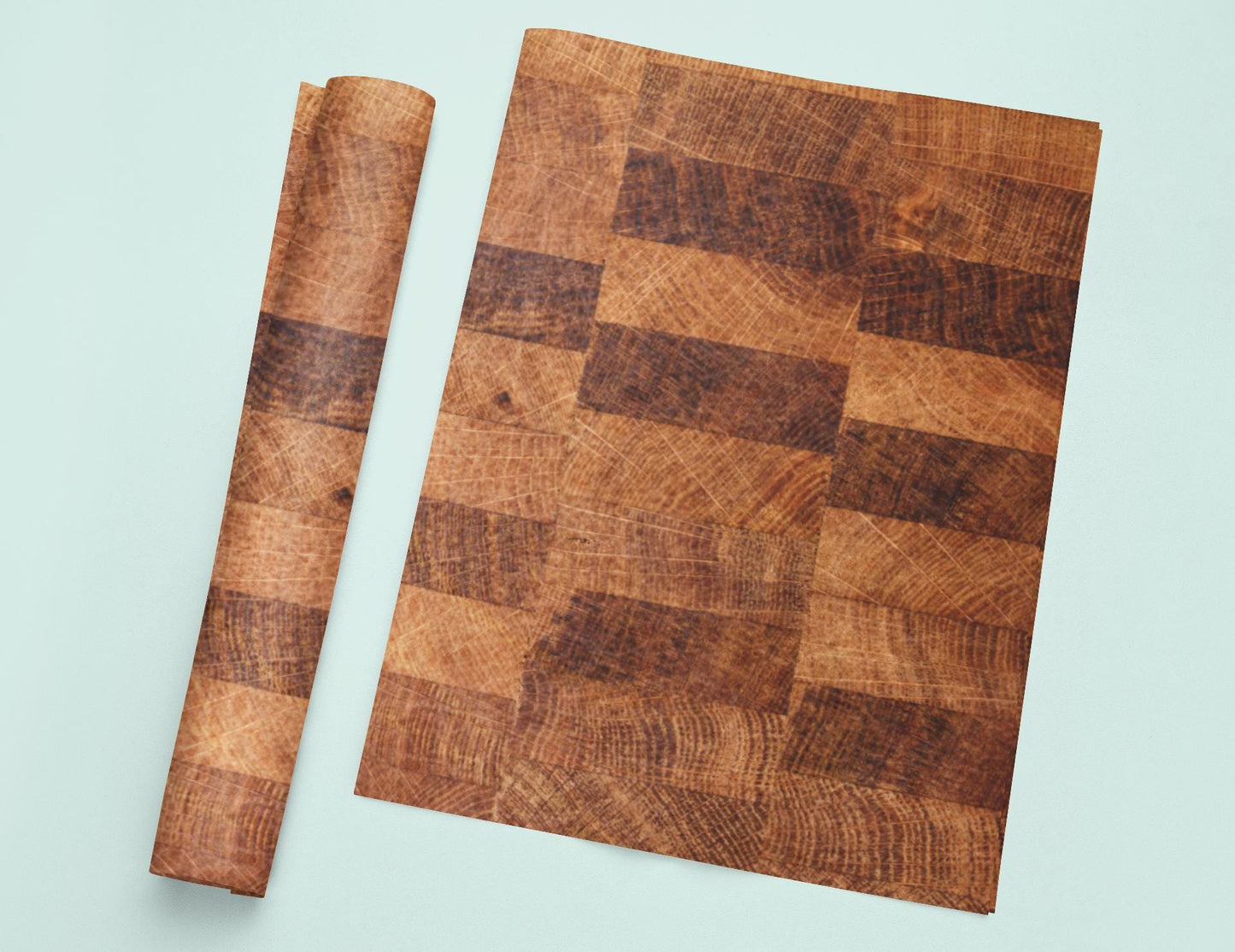 a wooden cutting board with a knife next to it