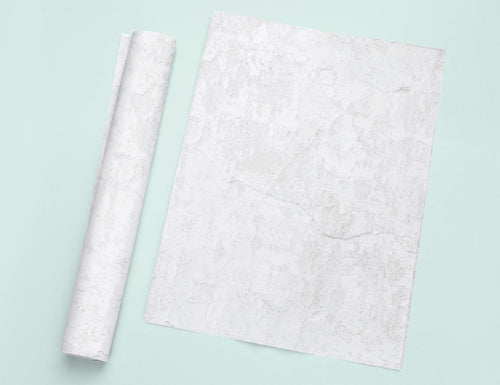 a piece of white paper next to a roll of white paper
