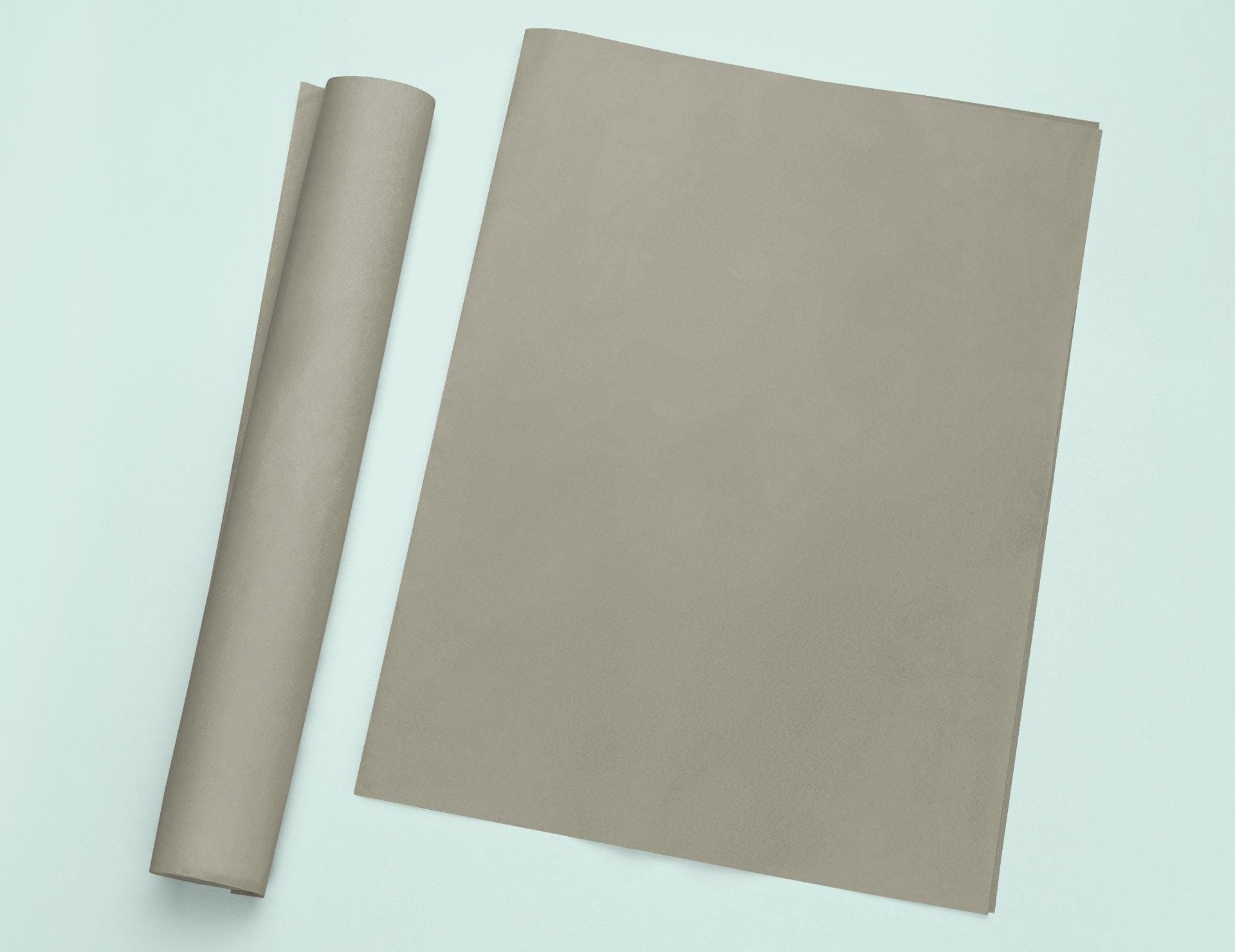 a roll of brown paper next to a roll of brown paper