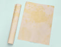 a rolled up piece of paper next to a rolled up piece of paper