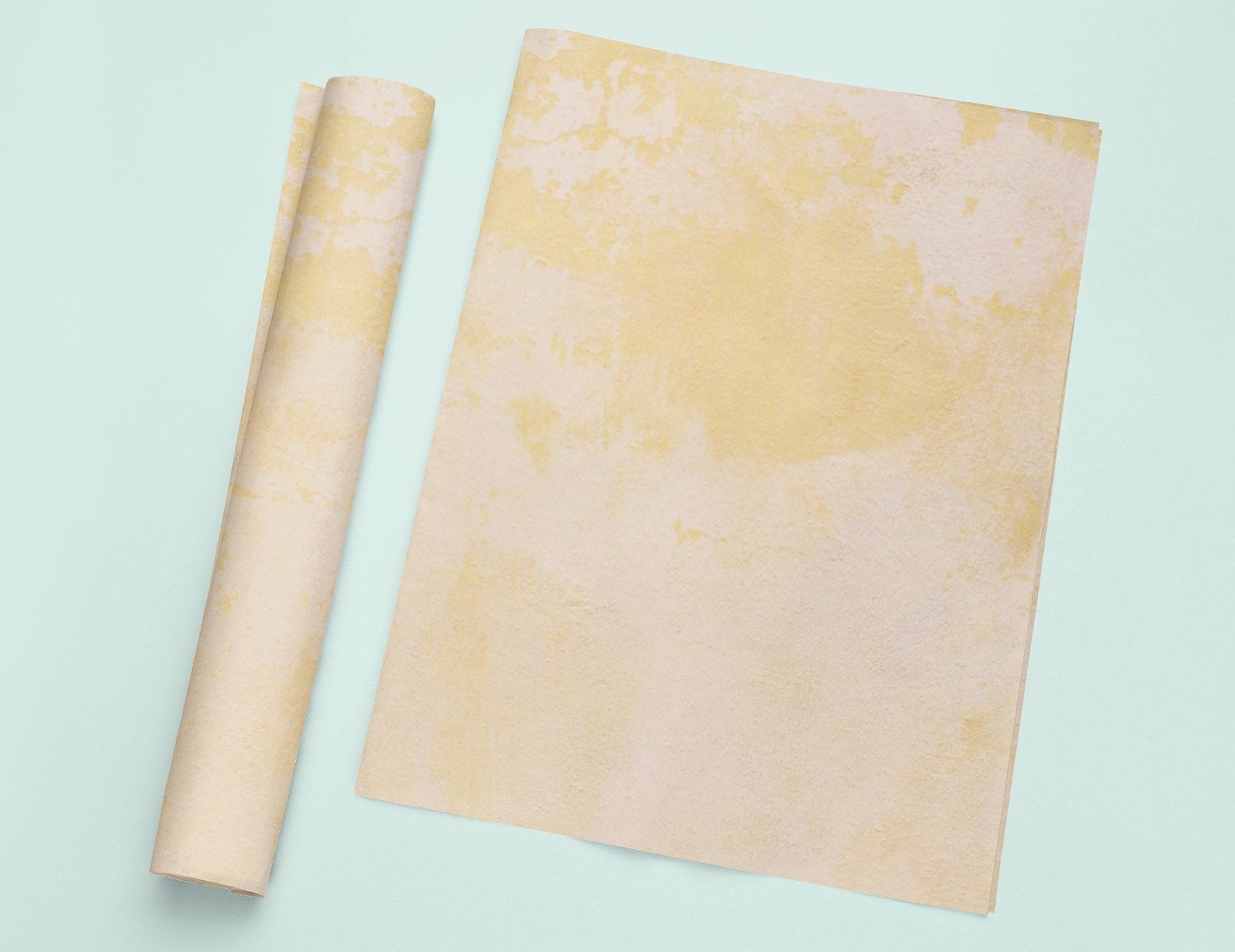 a rolled up piece of paper next to a rolled up piece of paper