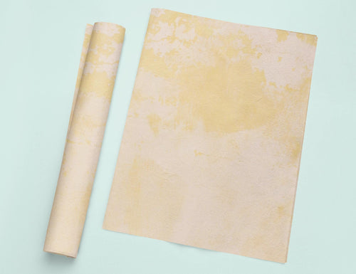 a rolled up piece of paper next to a rolled up piece of paper