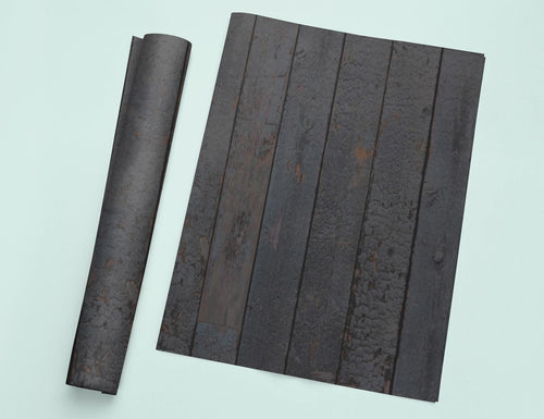 a piece of wood that is laying on the ground