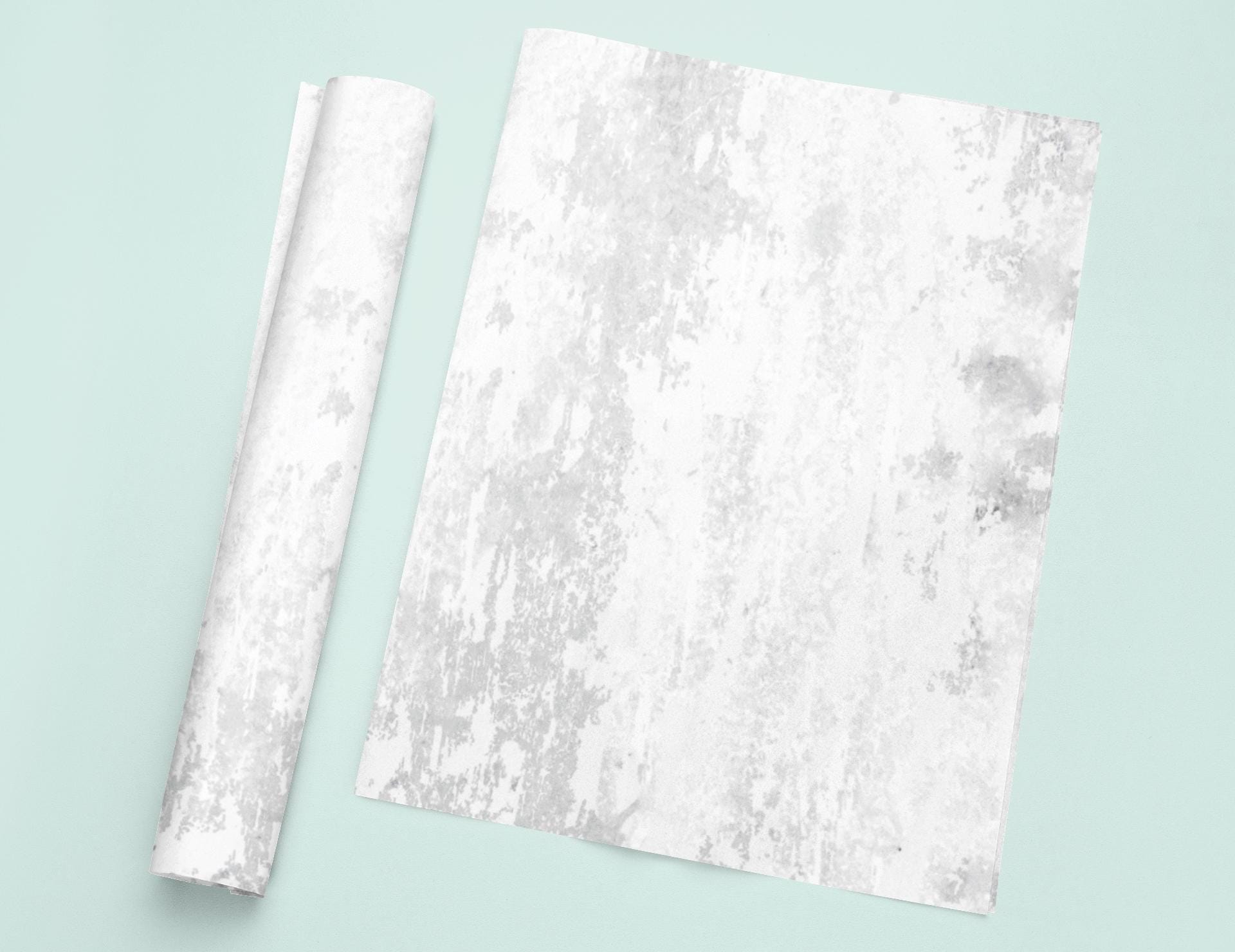 a piece of paper with a roll of paper on top of it